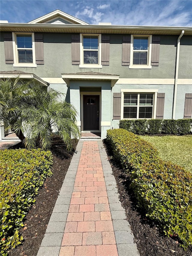 view of front of home featuring stucco siding