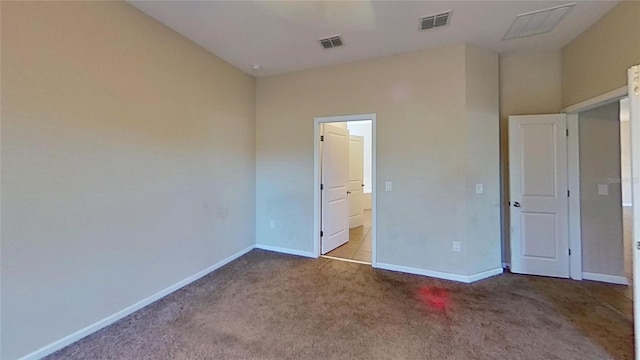 unfurnished bedroom with light carpet