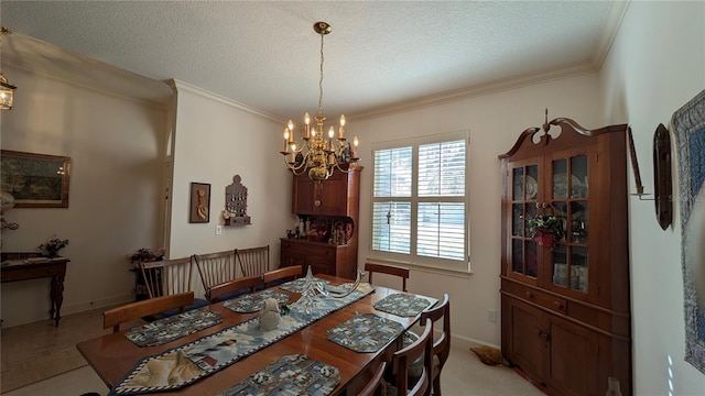 dining space with ornamental molding, an inviting chandelier, and a textured ceiling