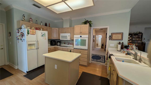 kitchen featuring light brown cabinets, white appliances, ornamental molding, a kitchen island, and light hardwood / wood-style floors