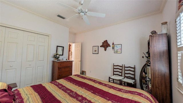 bedroom featuring a closet, ceiling fan, and ornamental molding