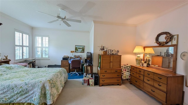 carpeted bedroom with ceiling fan, ornamental molding, and a textured ceiling