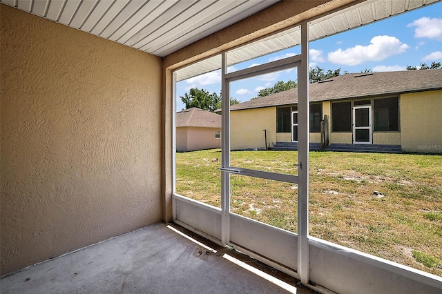 unfurnished sunroom with a healthy amount of sunlight