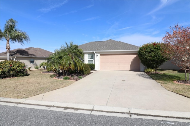 ranch-style house with a garage and a front yard