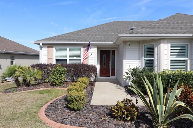 view of front of property with a front lawn