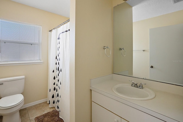 bathroom with tile patterned floors, toilet, a shower with curtain, and vanity