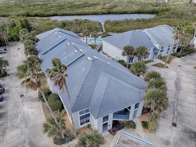 drone / aerial view with a water view