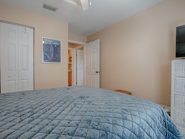 unfurnished bedroom featuring a closet and ceiling fan