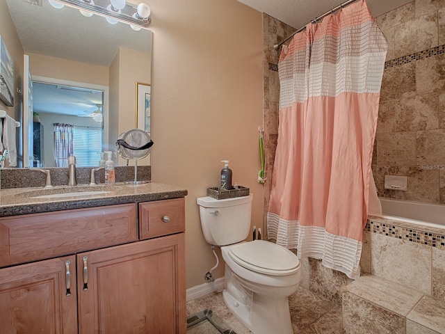 full bathroom featuring toilet, vanity, and shower / tub combo with curtain