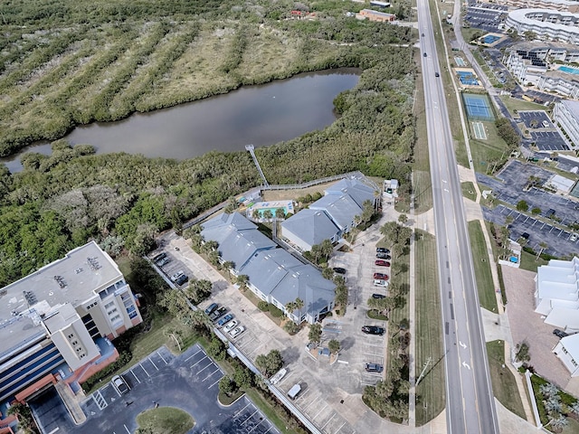 birds eye view of property featuring a water view