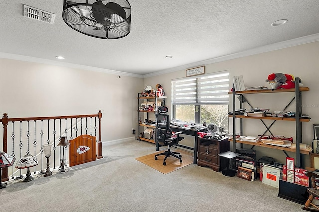 home office featuring light carpet, a textured ceiling, and crown molding