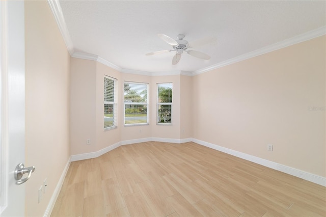 empty room featuring crown molding, ceiling fan, and light hardwood / wood-style flooring