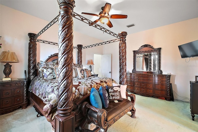 bedroom featuring ceiling fan and light carpet