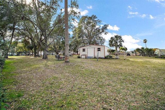 view of yard with a storage shed