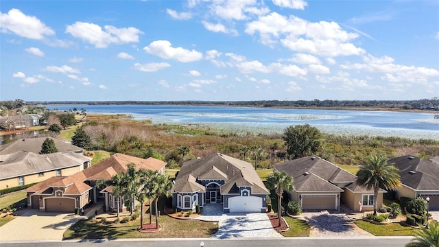 birds eye view of property featuring a water view