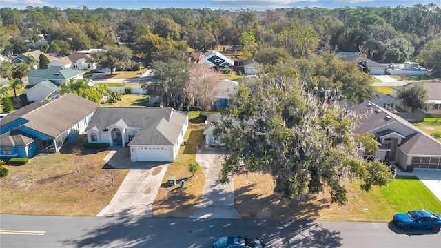 aerial view with a forest view and a residential view