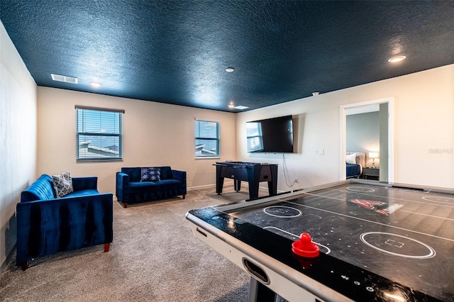 1257 Challenge Dr, Davenport, FL 33896 - rec room with a textured ceiling, carpet flooring, and recessed lighting