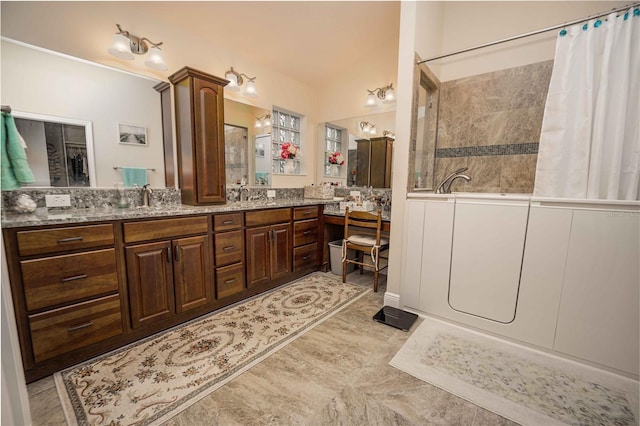 bathroom featuring vanity and plus walk in shower