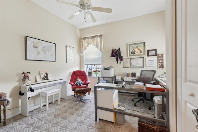 carpeted office space with ceiling fan