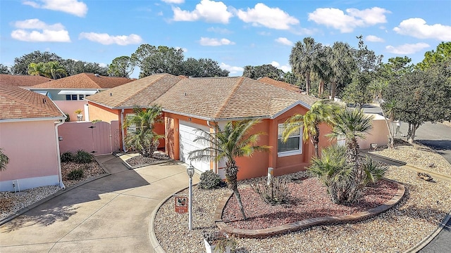 view of front of property with a garage