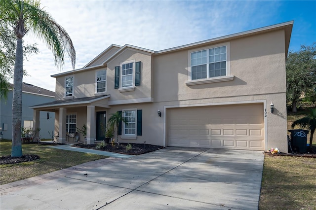 front of property featuring a garage