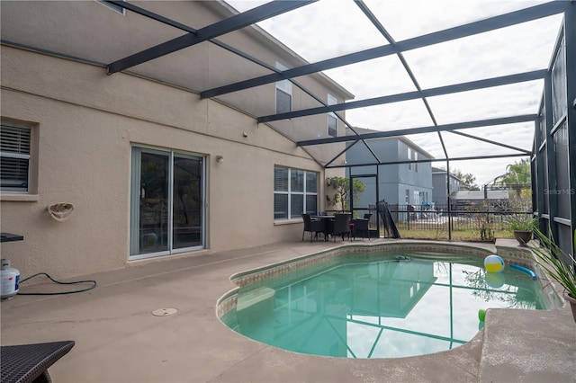 view of pool featuring a lanai and a patio