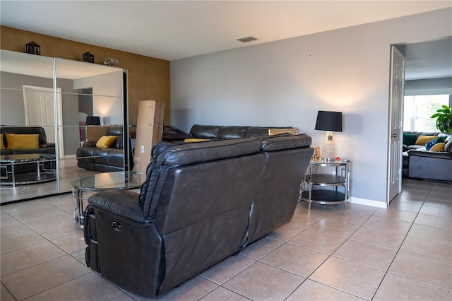 living room featuring light tile patterned floors