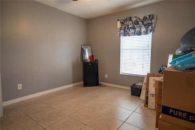 misc room with light tile patterned flooring