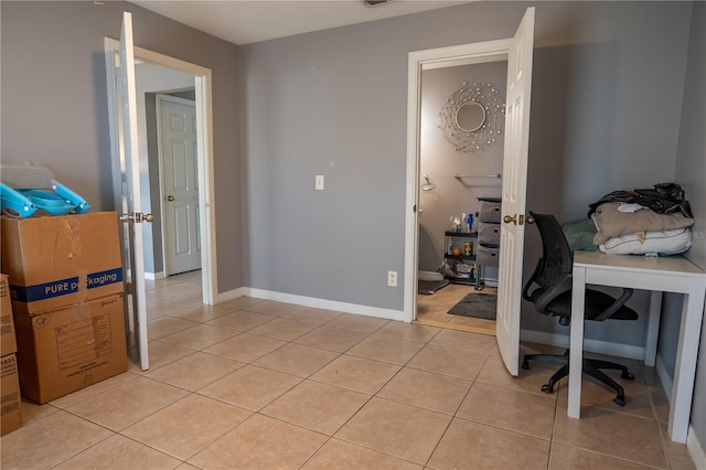 office with light tile patterned flooring