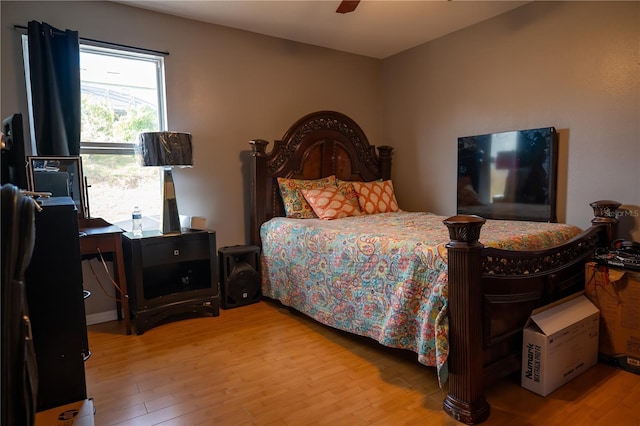 bedroom featuring ceiling fan and light hardwood / wood-style flooring