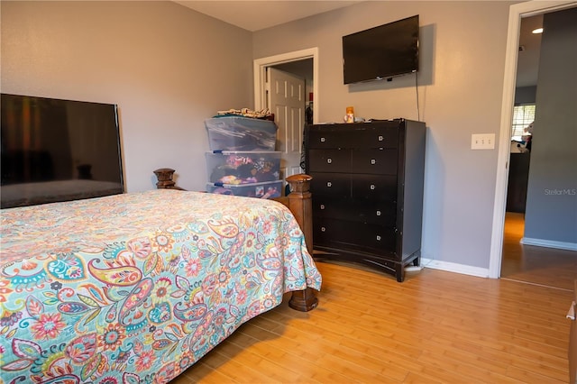 bedroom featuring light hardwood / wood-style floors