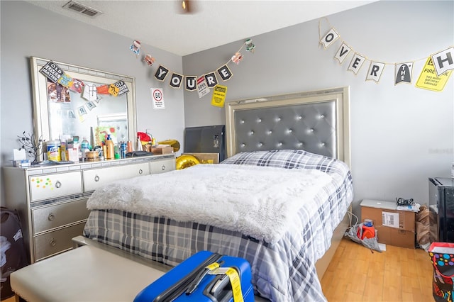 bedroom with light wood-type flooring