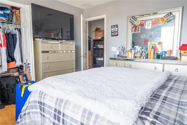 bedroom featuring a closet and hardwood / wood-style floors