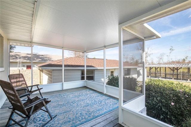 sunroom / solarium featuring plenty of natural light