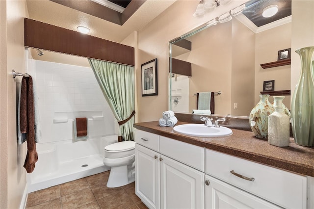 bathroom featuring crown molding, tile patterned flooring, vanity, curtained shower, and toilet