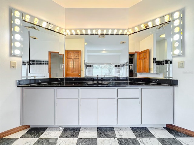 bathroom with vanity and walk in shower