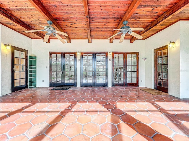 view of patio / terrace featuring ceiling fan and french doors