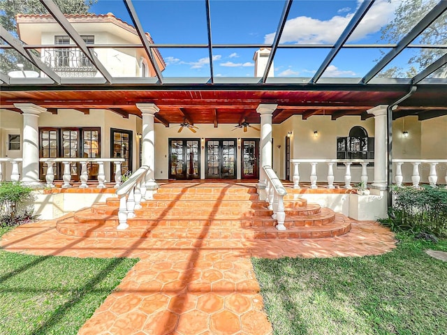 exterior space with ceiling fan and french doors