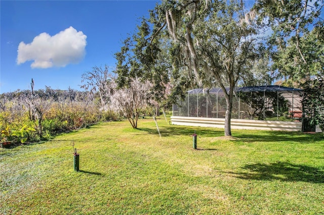 view of yard featuring a lanai