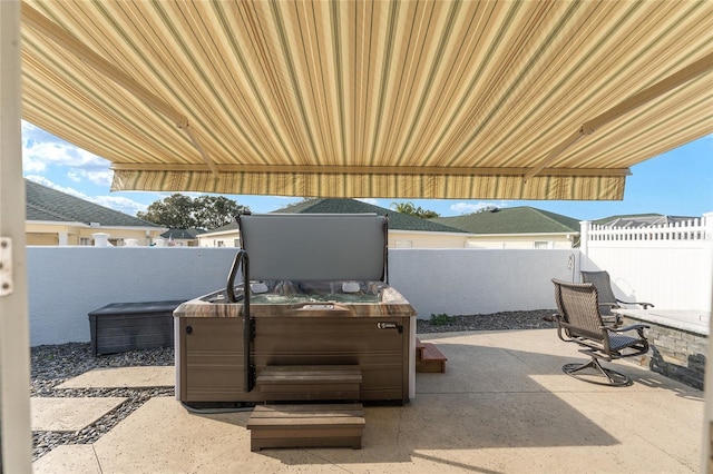 view of patio featuring a hot tub