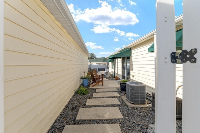 view of patio / terrace with central AC unit