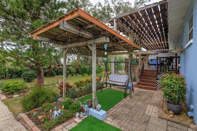 view of patio featuring a pergola