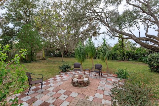 view of patio / terrace featuring a fire pit