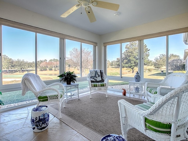 sunroom / solarium with ceiling fan