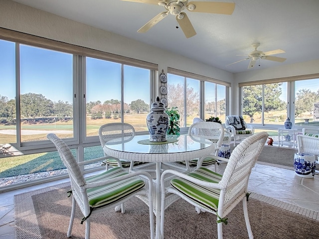 sunroom with ceiling fan