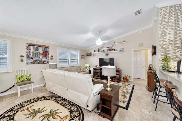 living room featuring baseboards, visible vents, ceiling fan, vaulted ceiling, and crown molding