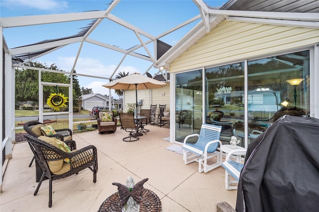 view of patio / terrace with glass enclosure