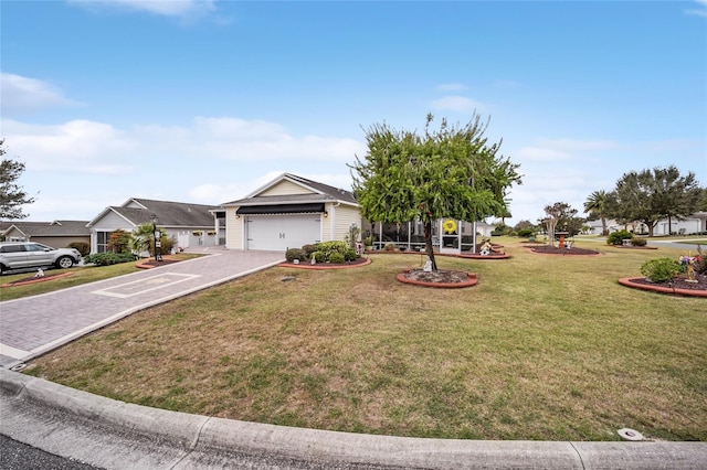 view of front of property featuring a residential view, a front lawn, and decorative driveway