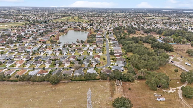 aerial view featuring a water view and a residential view