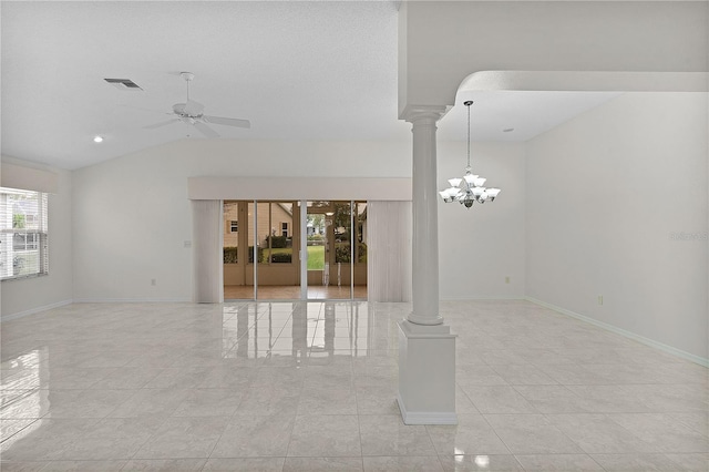 empty room with ornate columns, vaulted ceiling, and ceiling fan with notable chandelier